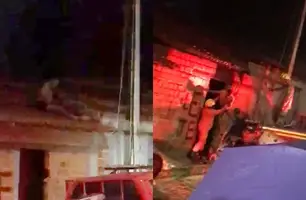 Homem baleado é retirado de telhado de residência (Foto: Reprodução)