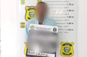 Suspeito preso (Foto: Divulgação)