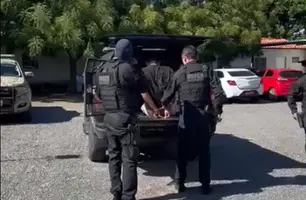 Suspeito preso (Foto: Divulgação)