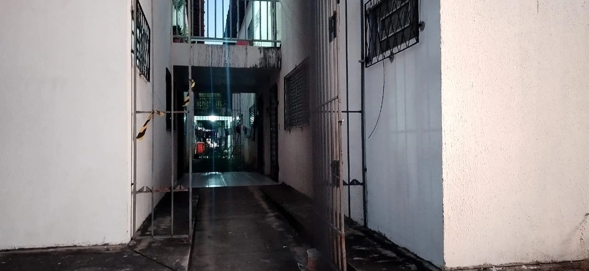Entrada do apartamento da vítima