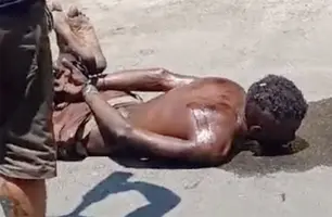 Suspeito de furto é amarrado deitado em asfalto e exposto ao sol em Teresina (Foto: Reprodução)