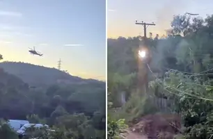Helicóptero alvo de disparos acaba esbarrando na rede elétrica ao desviar dos tiros (Foto: Reprodução)