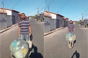 Morador carrega lixo em carrinho de mão por falta de coleta em Teresina (Foto: Reprodução)
