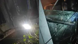 Caminhão de lixo capota durante chuva e deixa auxiliar de coleta ferido em Nazária (Foto: Repórter 12/Conecta Piauí)