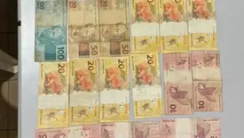 Frentista é conduzido à delegacia suspeito de desviar mais de R$ 20 mil de posto (Foto: Reprodução)