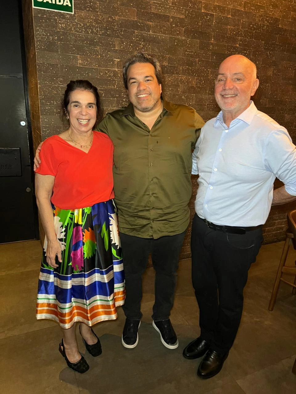 Casal de empresários Jany Freitas e Odilon Freitas com o filho Rafael Freitas