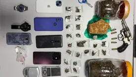 Mulher é presa com arma, drogas e balanças de precisão em Teresina (Foto: Reprodução)